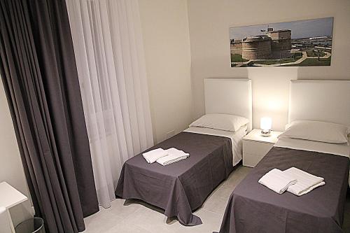 Imagen de la galería de Quattro Stelle al Porto Guest House, en Civitavecchia