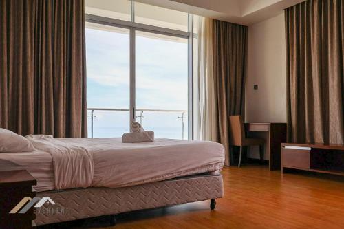 Ένα ή περισσότερα κρεβάτια σε δωμάτιο στο Bay Resort by Evernent