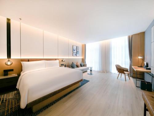 Cama o camas de una habitación en Four Points by Sheraton Qingdao, Chengyang East
