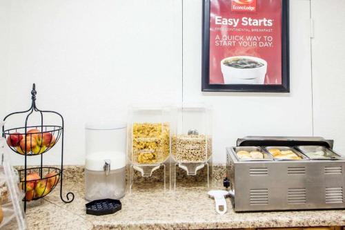 a counter with some food and a container of food at Econo Lodge Truman Inn in Sedalia