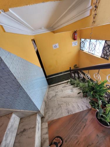 an overhead view of a staircase in a building at Hotel Bhardwaj in Namchi
