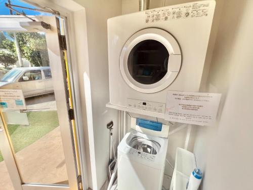 a washing machine and a washer in a room at Cruz Del Sur - Vacation STAY 11190v in Ishigaki Island