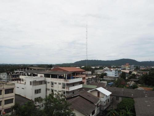 a view of a city with buildings at Regent Room Hotel in Suratthani