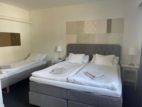 Cama o camas de una habitación en Björnlokan B&B