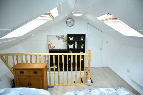 Ένα ή περισσότερα κρεβάτια σε δωμάτιο στο Watermead Retreat Bungalow in Birstall