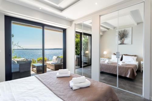 ADRIANA by Terry's Homes WATERFRONT SEAVIEW BEACH