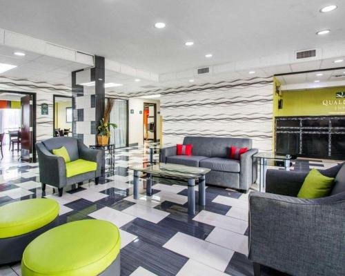 a lobby with couches and chairs and a table at Quality Inn Prattville I-65 in Prattville