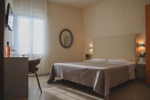 Postel nebo postele na pokoji v ubytování Hotel Eden