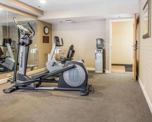 a fitness room with a gym with a treadmill at Sleep Inn Bessemer Helena in Bessemer