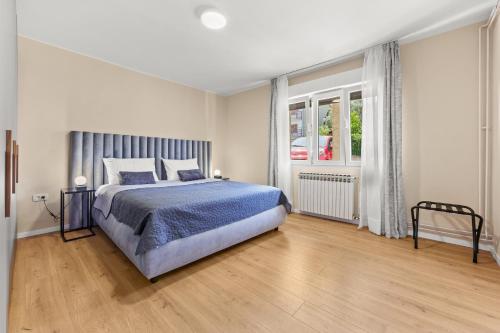 Ένα ή περισσότερα κρεβάτια σε δωμάτιο στο Four waves Apartment NEW