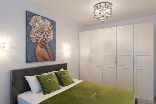 Cama ou camas em um quarto em Smile Apartments