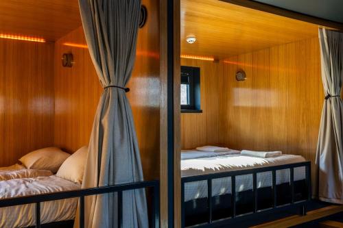 Cama ou camas em um quarto em Cyberdeck for big groups