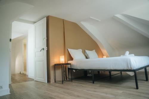 Katil atau katil-katil dalam bilik di La Maison sur la Loire À deux pas du cœur de Tours