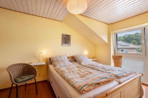 Postel nebo postele na pokoji v ubytování Ferienwohnung 'Sonneck'