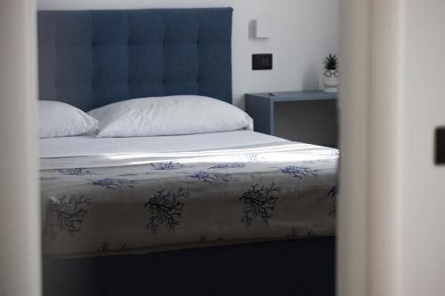 Letto o letti in una camera di 49 Downtown Pompeii