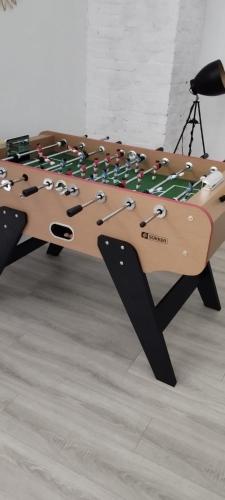 a wooden table with aoustic guitar on top at ++++ CENTRAL DUPLEX RENOVE 5 PIECES 150M2 A 8 MN DE LA PLACE DALTON ++++ in Boulogne-sur-Mer