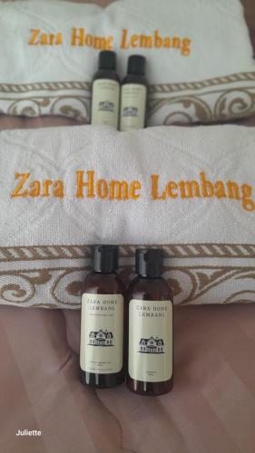 a group of four hair products sitting on top of a towel at Zara Home Lembang in Padasul