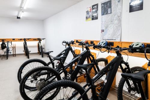 a group of bikes parked in a room at Corona Dolomites Hotel in Andalo