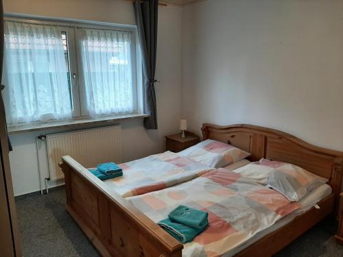 Ένα ή περισσότερα κρεβάτια σε δωμάτιο στο Lee