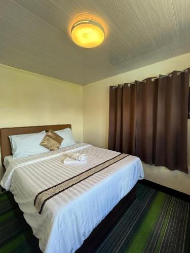 Letto o letti in una camera di AEROSTOP HOTEL & RESTAURANT