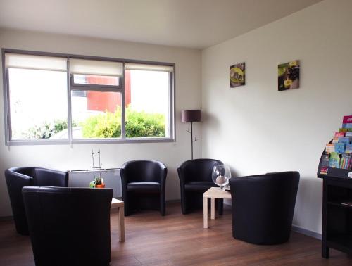 Гостиная зона в Hotel Inn Design La Rochelle