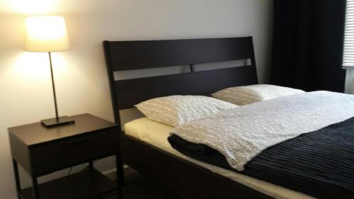 Posteľ alebo postele v izbe v ubytovaní Modern Apartment Kosińskiego