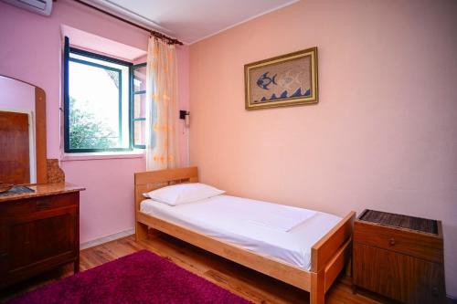 Postel nebo postele na pokoji v ubytování Apartment Postup
