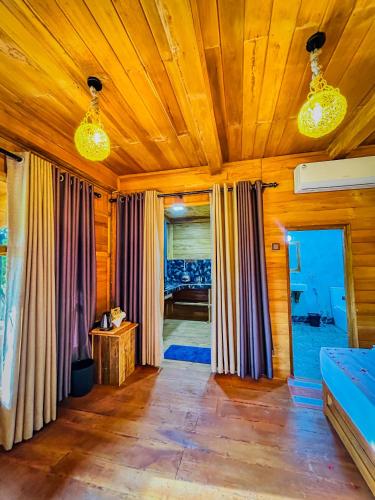 Una cama o camas en una habitación de Ama Villa