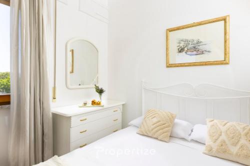 Postel nebo postele na pokoji v ubytování Istòria - by Propertize