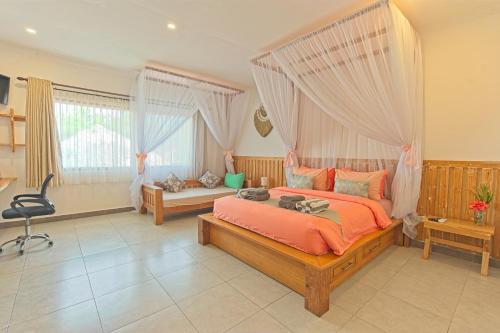 Postel nebo postele na pokoji v ubytování CoCo Breeze Spa Hotel
