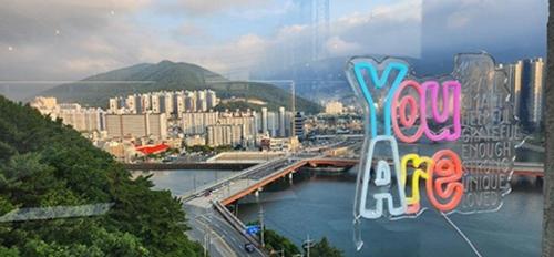a view of a city with a bridge over a river at Geoje Haewanaru Youthtel in Geoje 
