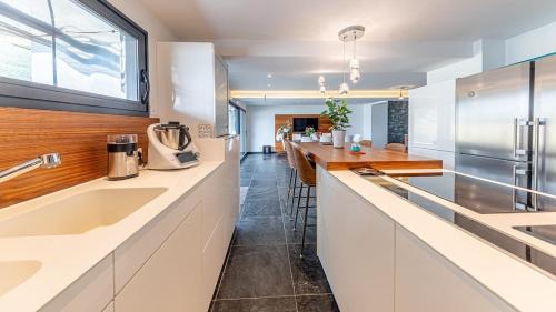 Køkken eller tekøkken på Villa Emeraude