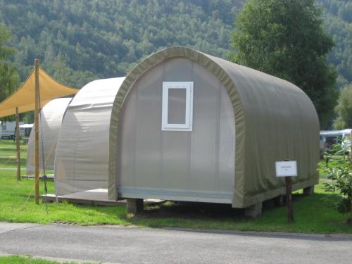 a couple of tents sitting in the grass at Coco Sweet in La Roche-en-Ardenne
