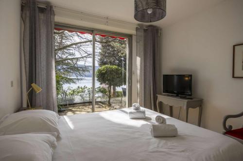 Giường trong phòng chung tại SavoieLac - Villa Alice