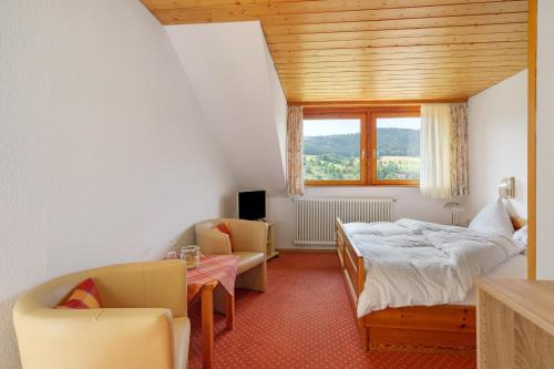 Postel nebo postele na pokoji v ubytování Hotel Eichberg by Ranæla