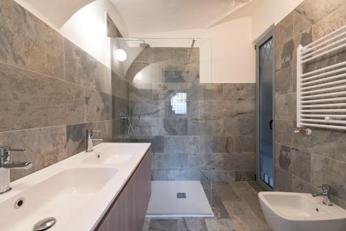 Koupelna v ubytování Hotel Rivalago