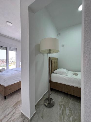 Una cama o camas en una habitación de Best Apartments