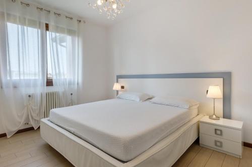Ένα ή περισσότερα κρεβάτια σε δωμάτιο στο Casa Vacanze da Ricky App 5