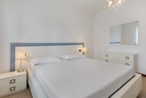 Ένα ή περισσότερα κρεβάτια σε δωμάτιο στο Casa Vacanze da Ricky App 5