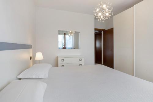 Ένα ή περισσότερα κρεβάτια σε δωμάτιο στο Casa Vacanze da Ricky App 5