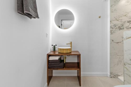 a bathroom with a sink and a mirror at Finca del silencio in Tolox