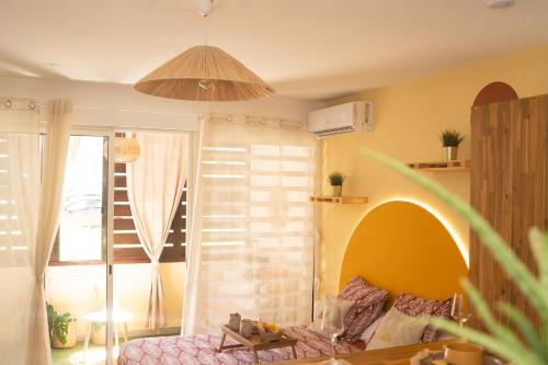 Llit o llits en una habitació de Studio Sunsweet