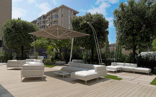 Un jardín fuera de Hotel Raffaello