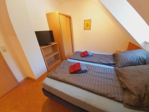 Ένα ή περισσότερα κρεβάτια σε δωμάτιο στο Katrins am Kölpinsee Doppelzimmer