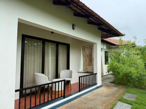 Balkón nebo terasa v ubytování Leopard Hill Resort - Bandipur