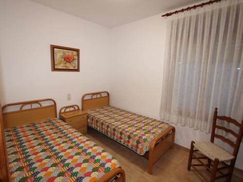 Posteľ alebo postele v izbe v ubytovaní Casa ideal cerca de la playa, wifi gratis y aire acondicionado - ES-184-57
