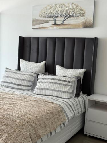 En eller flere senge i et værelse på Windhoek view