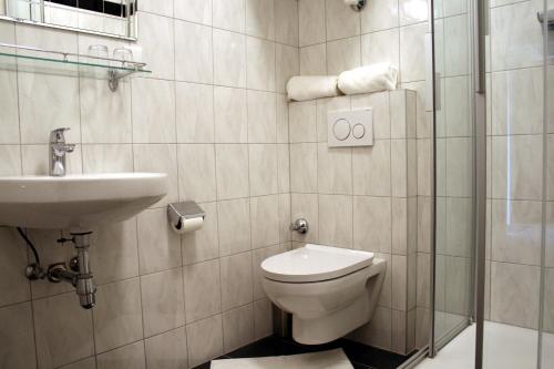 Et badeværelse på Seeappartements Excelsior Gartenpavillon