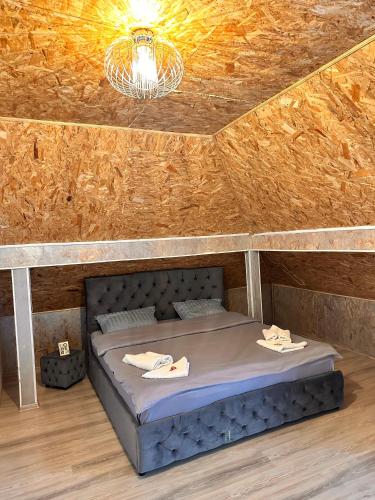 Ένα ή περισσότερα κρεβάτια σε δωμάτιο στο Vila Kalibu