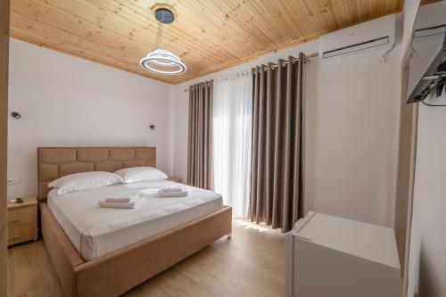 Postel nebo postele na pokoji v ubytování Vila Lukas